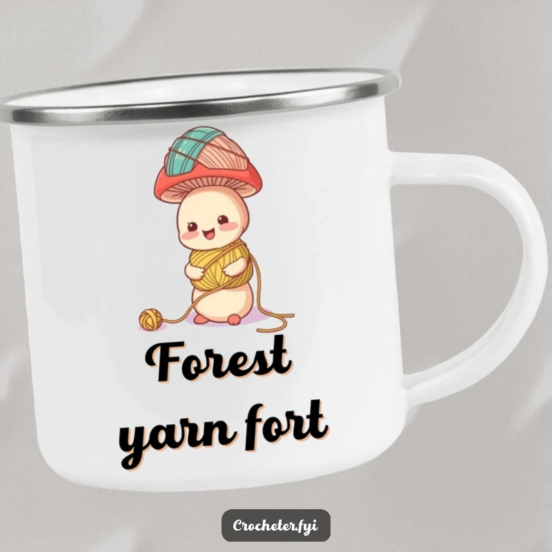 Funny enamel camping mug with a cheerful mushroom character balancing a towering stack of yarn balls, ideal for outdoor crafting.