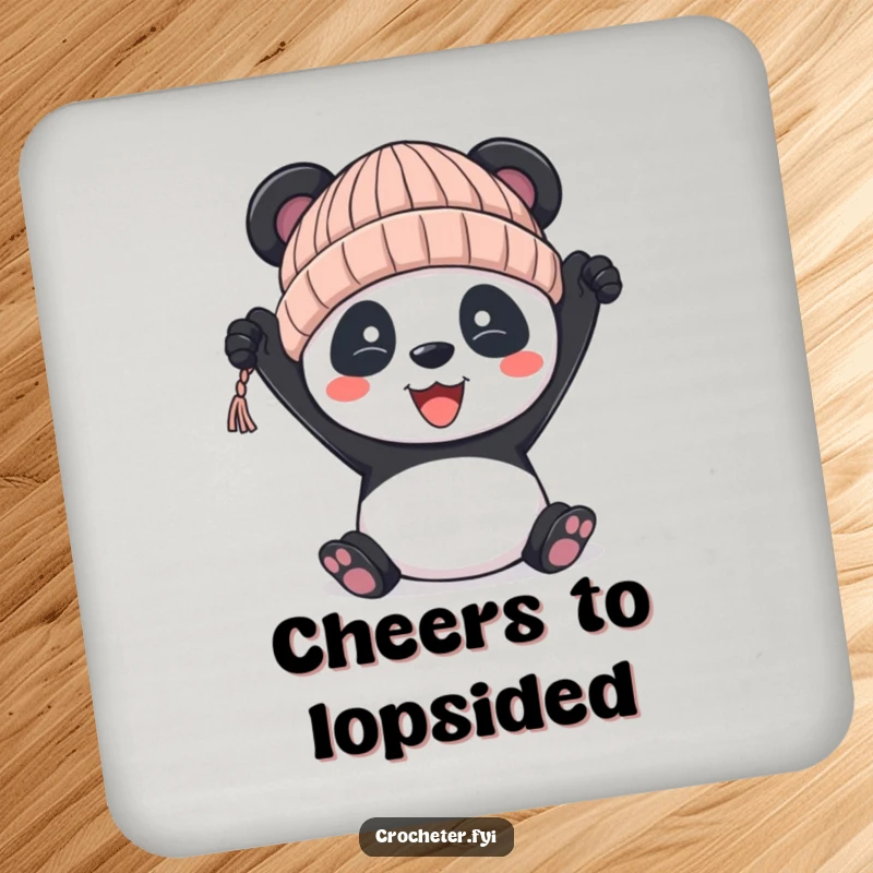 Funny panda drink coaster, depicting a panda holding a slightly wonky knitted hat, a charming table accessory.