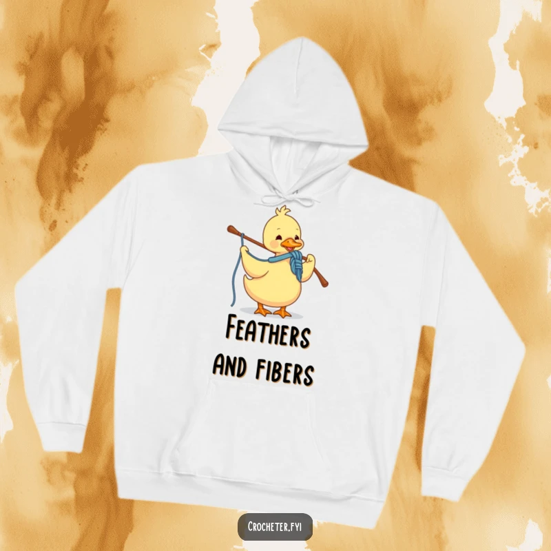 Funny hoodie with a cheerful duck skillfully crocheting a project using yarn and a hook, perfect for cozy crafting.