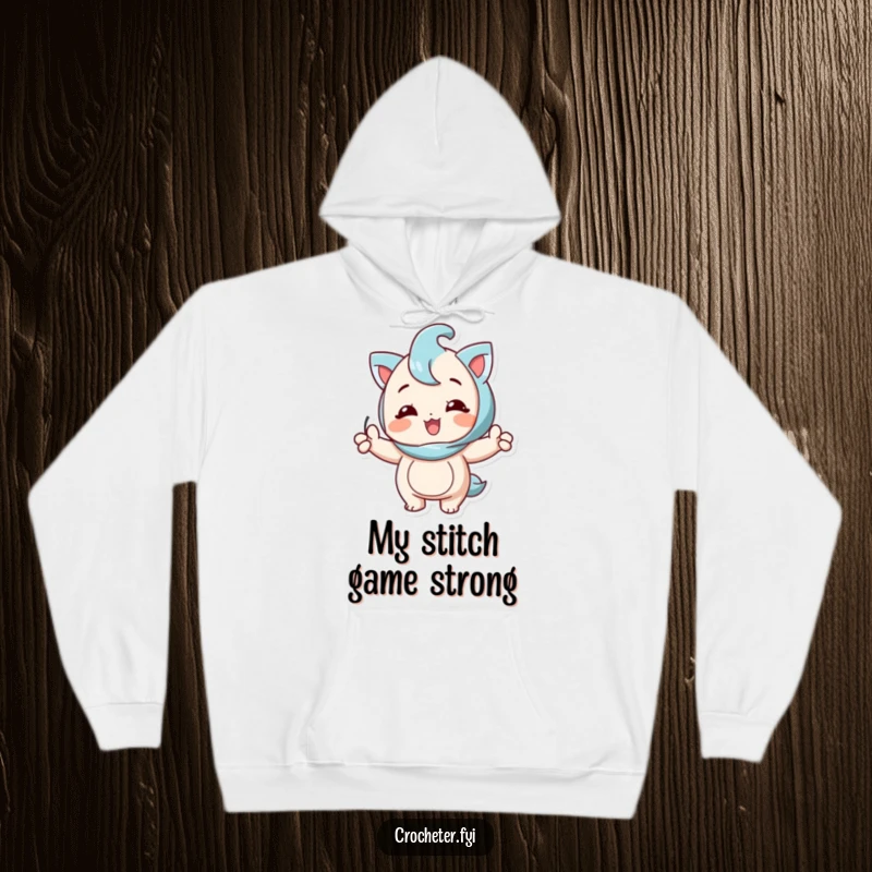 Funny hoodie with a happy character proudly exhibiting a flawless knitting stitch, perfect for cozy relaxation.