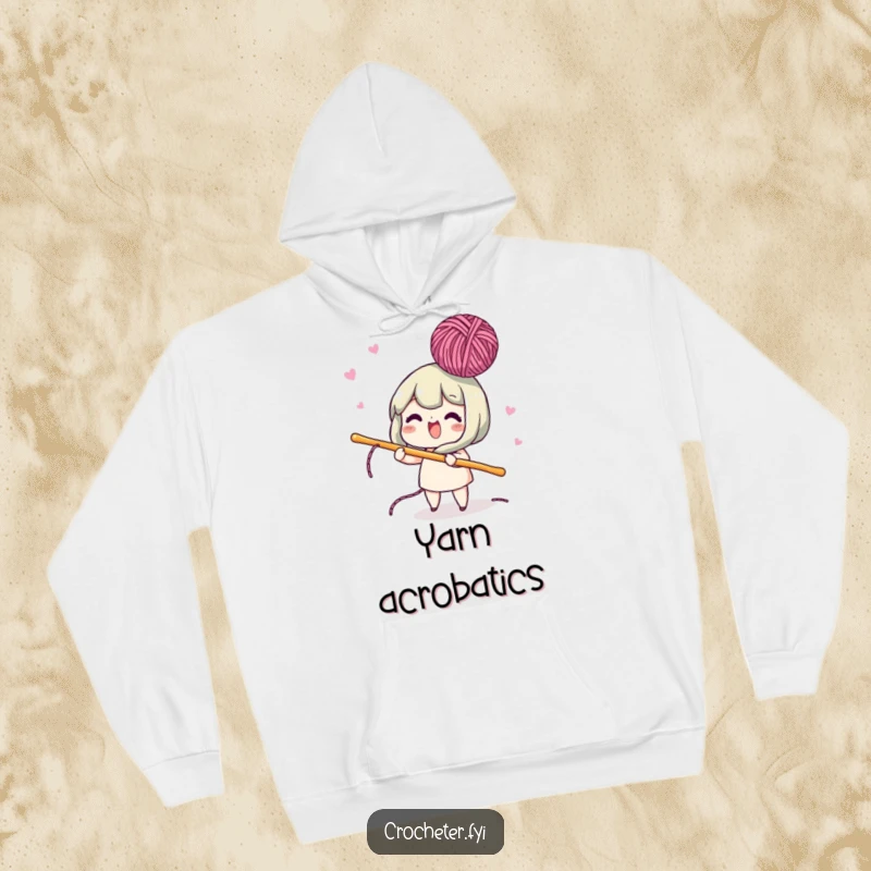 Funny hoodie featuring an energetic character using a crochet hook to lively bob yarn in the air, embodying playful crafting.