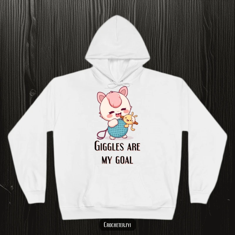 Funny Hoodie: A mischievous character playfully tickles a friend using a crochet hook, providing cozy humor and good times.