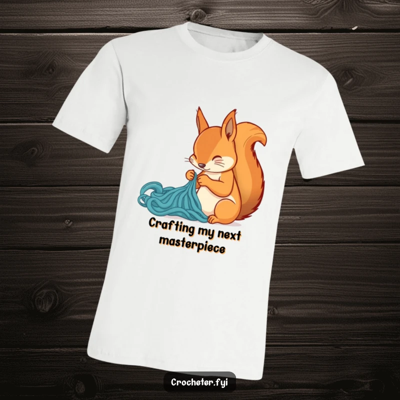 Funny squirrel creating a new stitch, depicted on a t-shirt, perfect for knitters and sewing lovers as a humorous gift.