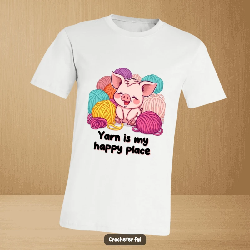 Funny giggling piglet playing in a pile of colorful yarn, featured on a t-shirt, a humorous and cute gift.